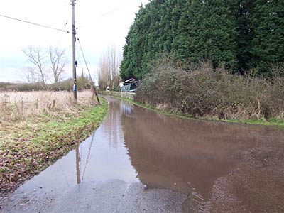 Floods at Sandford Mill approach road